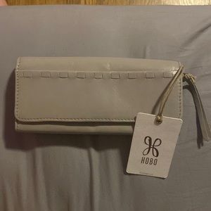 Hobo leather wallet in color cloud